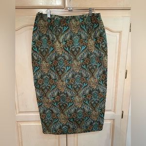 NWT size XL Midi skirt. The paisley design is adorned with wooden beading. WOW!